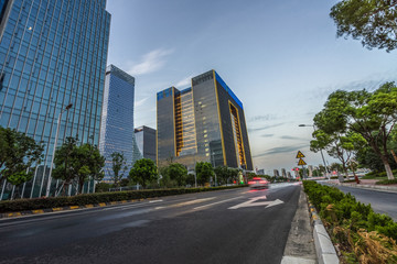 empty asphalt road front of modern buildings.