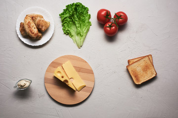 Multiple ingredients combined into a chicken sandwich