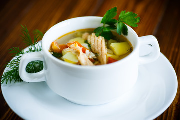 fish soup with vegetables in a plate