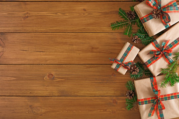 Colorful present boxes for any holiday on wooden background