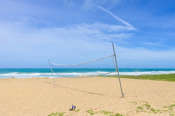 A ball game on the sand on the beach near the sea