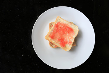 Bread with jam strawberry.