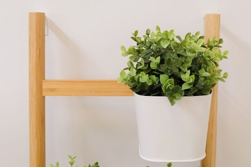 Green Artificial Plants in A Metal Pot