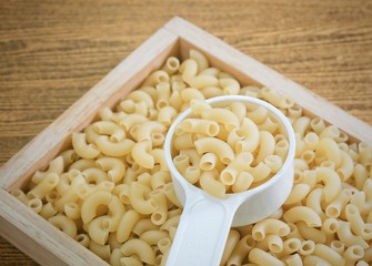 Elbow Macaroni or Gomiti Pasta in Measuring Cup