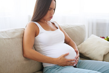 Pregnant woman suffering belly-ache