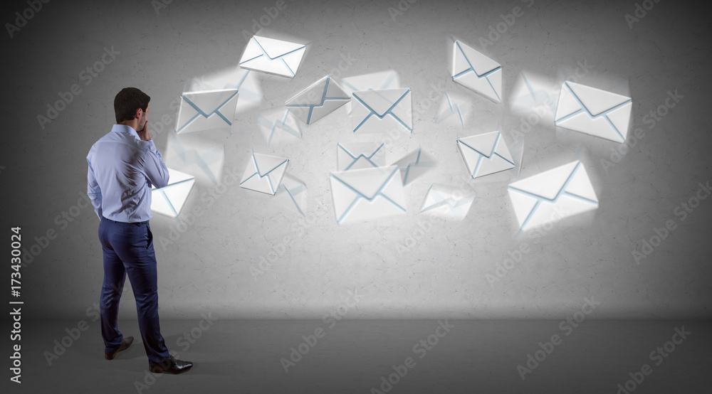 Poster Businessman using email interface on a wall 3D rendering