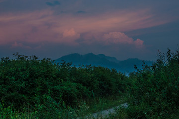 Pathway and glorious dawn over mountains