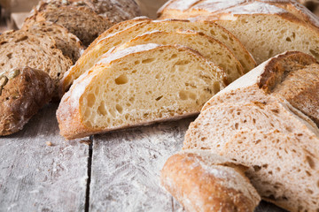 Bread background closeup on wooden table
