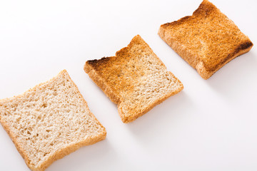 Toasted bread slices isolated at white background