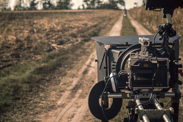 Fototapeta premium Compact professional mirrorless filming camera rig outdoors in production