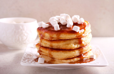 Pancakes with caramel sauce and marshmallow