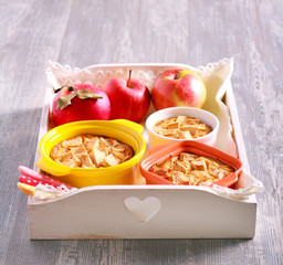 Apple puddings in small tins