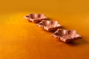 Rangoli design around Diwali lamp Indian Festival