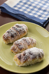 Homemade domestic rolls with coconut served on the plate