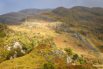 Fototapeta premium Rainbow over the lochaber hills,Scotland