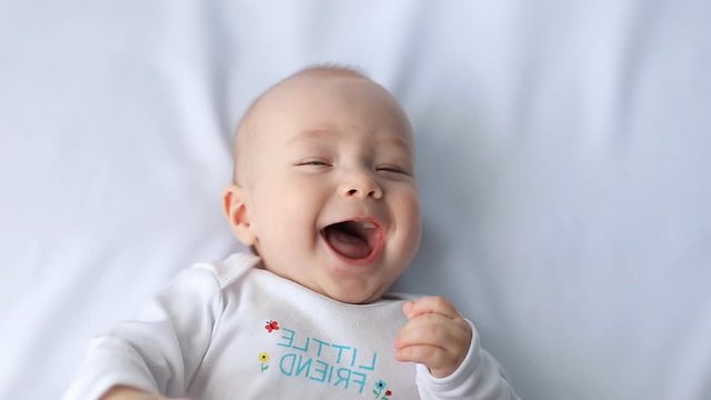 Cute little boy laughing, sound included.