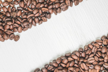 Frame of coffee beans with free space for text, white background top view