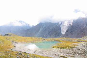 Russia, Republic of Altai. Very beautiful pictures of nature in Altai High snow-capped mountains, fast, noisy mountain rivers, beautiful meadows and fields and woods - the nature of mountain Altai
