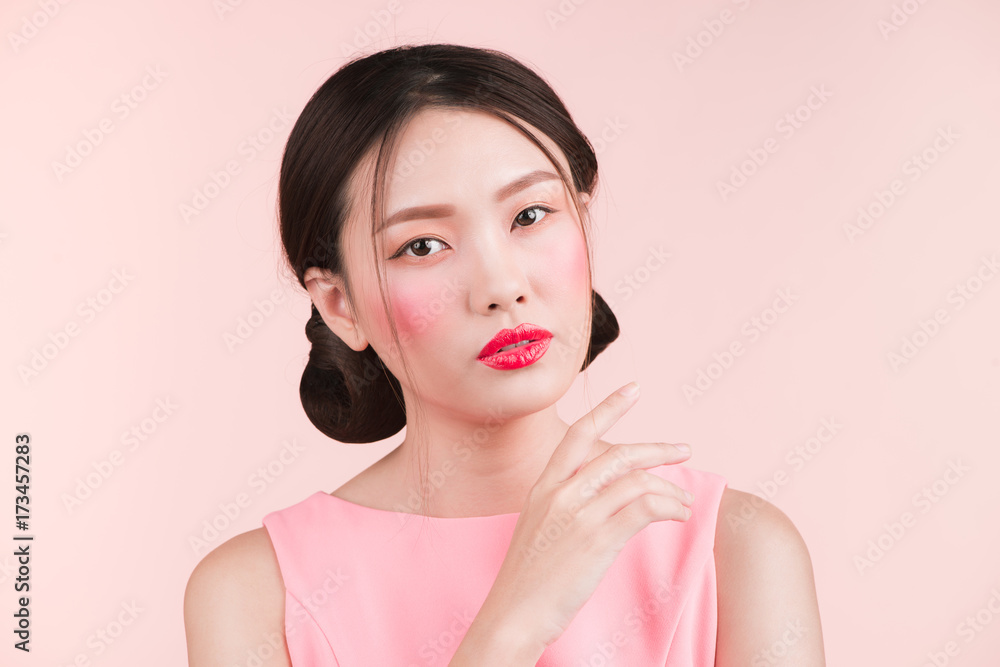 Wall mural beauty portrait of female face with red lips.