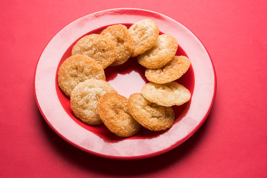 Stock Photo of Anarsa which is an authentic Maharashtrian sweet pastry-like dish especially made in the festive season in Maharashtra and Bihar, selective focus
