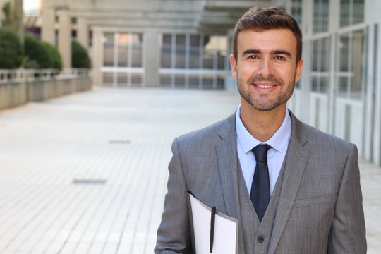 Classically good looking male isolated in office space