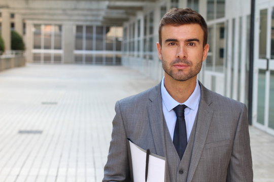 Classically good looking male isolated in office space 