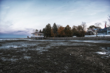 ebb in baltic sea. low water and town