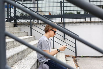 Attractive teenage boy in urban background