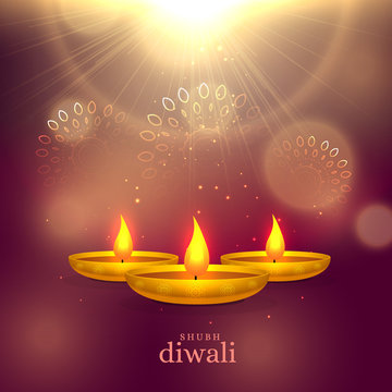shiny diwali festival greeting background with golden diya and light effect