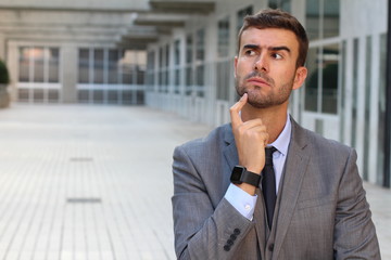 Businessman deep in thoughts close up