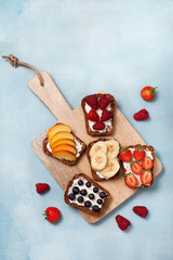 Toasts with cream cheese and fresh berries