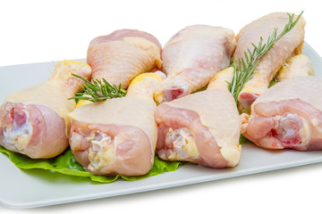 chicken thighs on white plate and white background