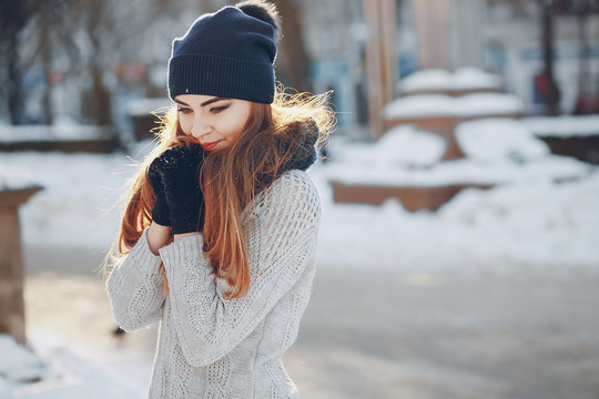 Girl Walking In A Winter City