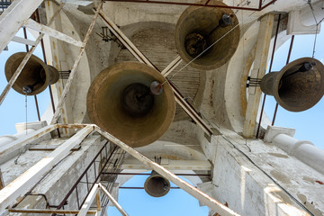 A number of different-sized bells in the Prepodobenskaya bell tower of the Rizopolozhensky female...