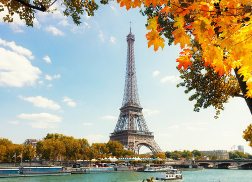 eiffel tour over Seine river with fall tree, Paris, France - Powered by Adobe