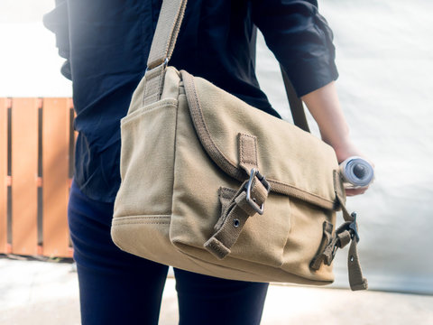 Woman with canvas shoulder bag.Concept of messenger,student,traveler