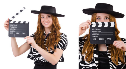 Young woman with movie clapboard isolated on white