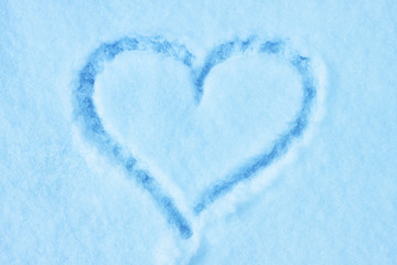 heart shape drawing on the snow