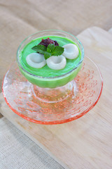 Green tea pudding with red bean Japanese style.