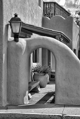 Arch and courtyard behind, Southwest traditional building styles