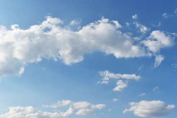 Fototapeta na wymiar Cloudy Blue Sky with White Clouds