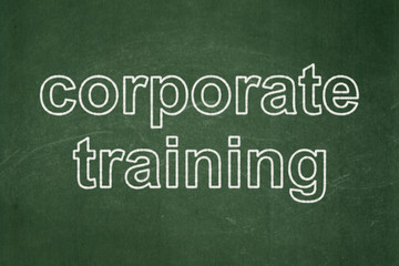 Obraz premium Learning concept: Corporate Training on chalkboard background