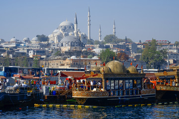 View of Istanbul with boats in the foreground and Suleymaniye Camii (Mosque)