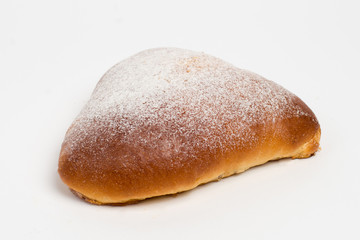 Sweet cinnamon bun roll swirl isolated over the white background