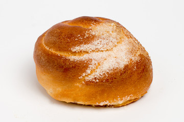 Sweet cinnamon bun roll swirl isolated over the white background