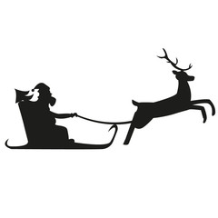 Santa Claus rides in a sleigh in harness on the reindeer