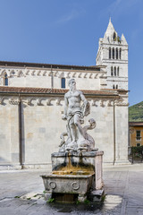 The famous Fontana del Gigante fountain in Piazza Duomo square, historic center of Carrara, Italy