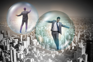 Businessman flying inside the bubble