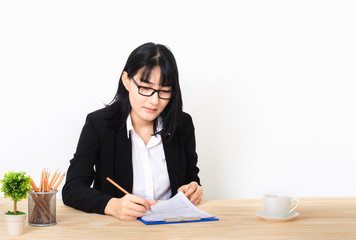 attractive businesswoman on white background thoughtful thinking about work in new project.