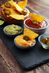 Nachos Tortilla Chips and jalapeños Chili Peppers or Mexican ch